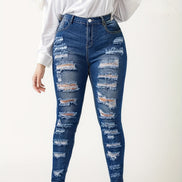 Titre conseillé :  Jean Skinny Femme Destroy – Coupe Ajustée