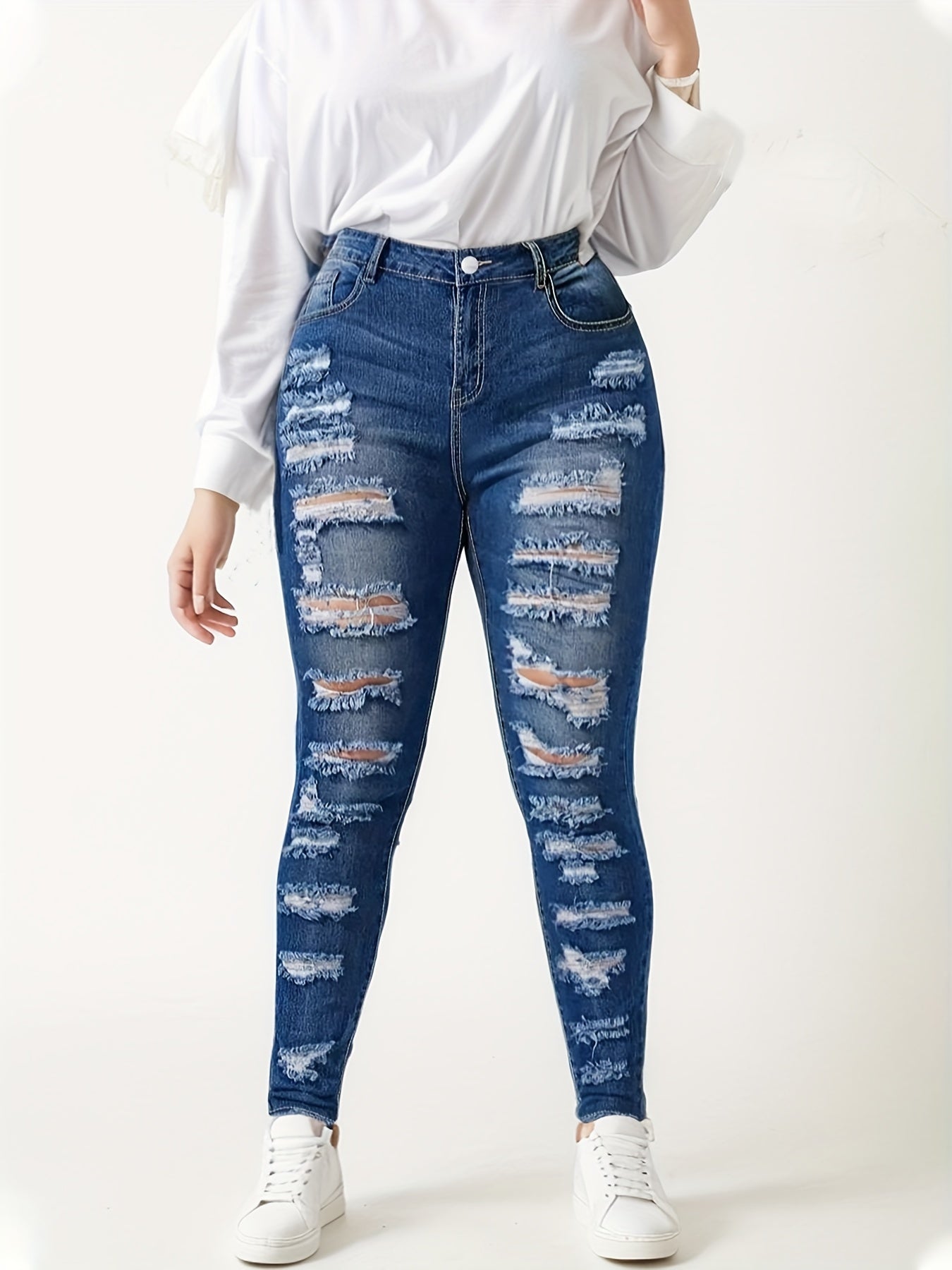 Titre conseillé :  Jean Skinny Femme Destroy – Coupe Ajustée